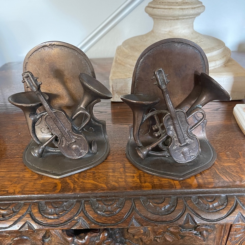 Pair of vintage bronze musical instrument bookends. Andrea by Sadek.